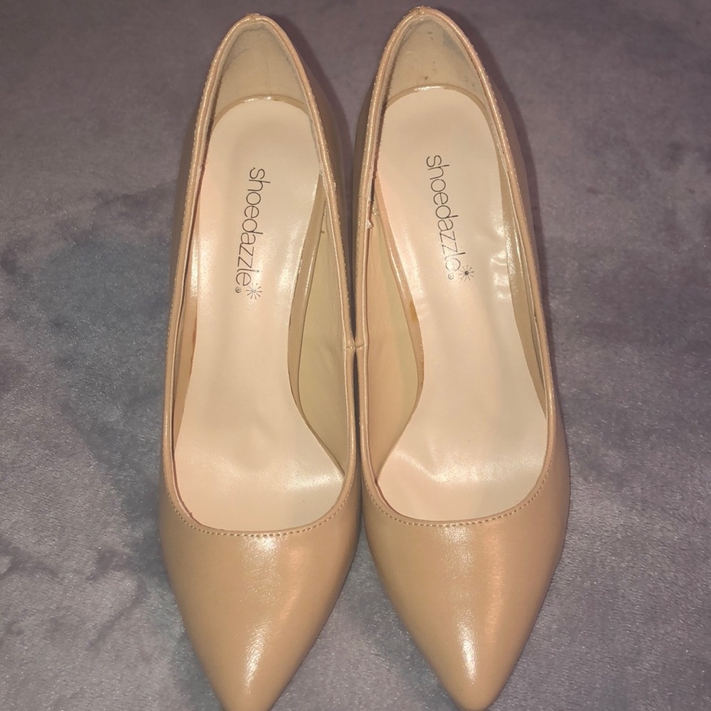 Nude pointed heels.